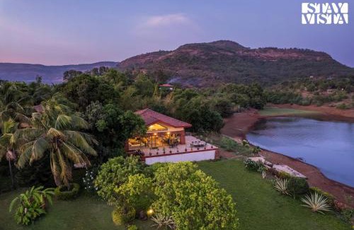 Wadgaon Villa | StayVista at Three Shores with Lake View & Alfresco Dining