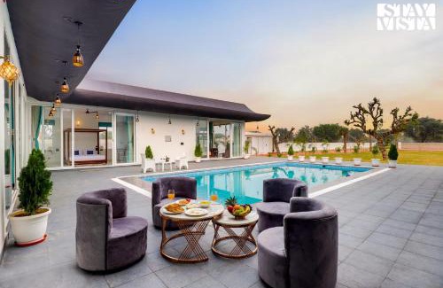 Jaipur Villa | StayVista's Kundan Villa - Pet-Friendly Villa with Sprawling Lawn, Outdoor Pool