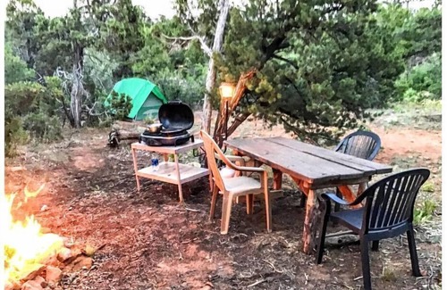Monticello Apartment | Step back in time with The 70s Rock N Roll Camper Van, where nostalgia meets outdoor adventure.