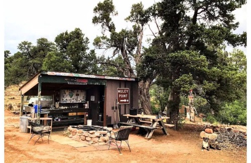 Monticello Apartment | Step back in time with The 70s Rock N Roll Camper Van, where nostalgia meets outdoor adventure.
