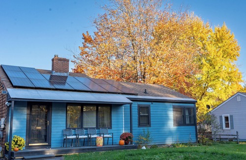 South Burlington House | Step into a world where midcentury modern charm embraces Vermont's beauty!