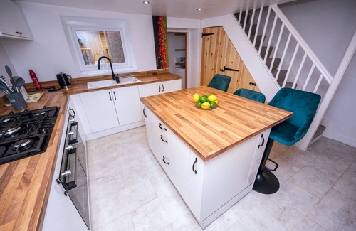 Port Talbot House | Step straight onto Afan Forest’s world-class bike trails from this two-bed, dog-friendly hideaway. Unwind by the crackling log burner after a day of adventure, stream movies on fast Wi-Fi or fire up the outdoor BBQ for dinner under the stars.<