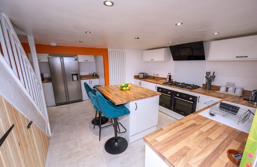 Port Talbot House | Step straight onto Afan Forest’s world-class bike trails from this two-bed, dog-friendly hideaway. Unwind by the crackling log burner after a day of adventure, stream movies on fast Wi-Fi or fire up the outdoor BBQ for dinner under the stars.<