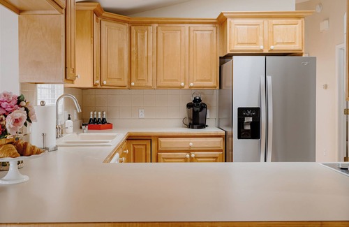 Grand Beach Cottage | Steps to beach, heated pool, big yard w/fire pit, 2 blks to playground