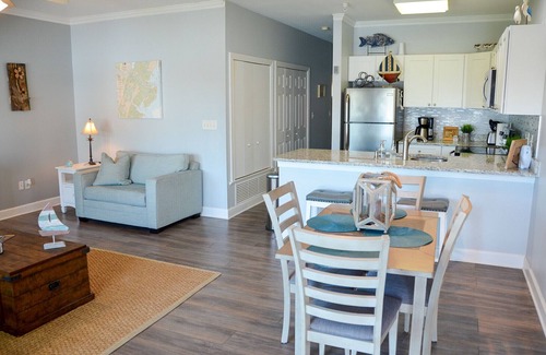 Tybee Island Condo | Steps to beach, restaurants, shops & pier ~ updated ~ large deck ~ fully stocked
