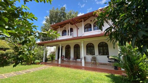 Harispattuwa House | Stone Arch Villa A Timeless Retreat with a Free Kandy Lake Boat Tour