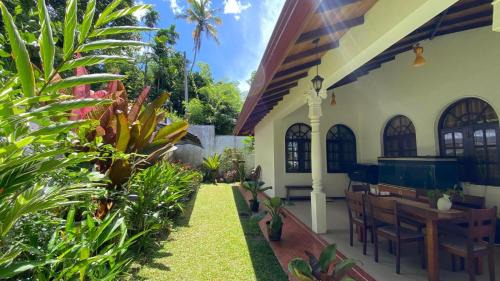 Harispattuwa House | Stone Arch Villa A Timeless Retreat with a Free Kandy Lake Boat Tour