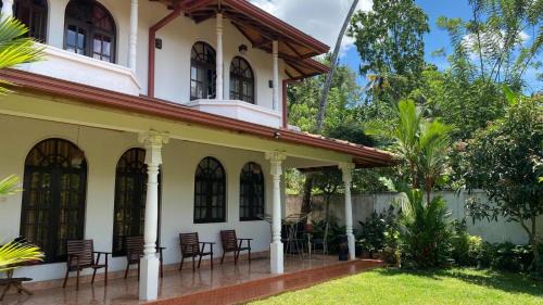 Harispattuwa House | Stone Arch Villa A Timeless Retreat with a Free Kandy Lake Boat Tour