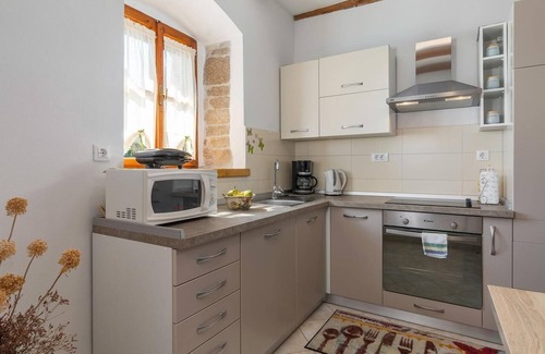 Kastelir House | Stone house Malia with garden, BBQ, outdoor shower and bikes