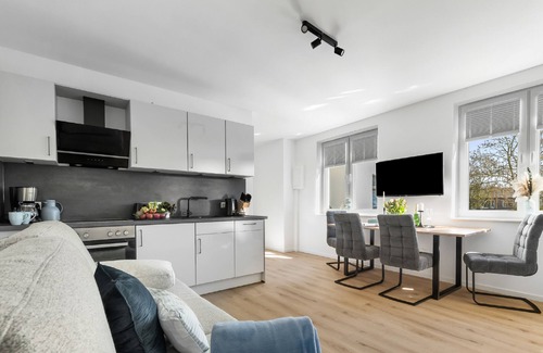 Gelting Apartment | Strandleben - upper floor, bathroom with shower, TV, parking space, terrace, barbecue, garden furniture,
