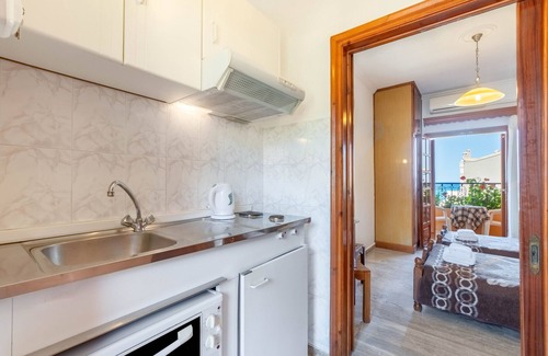 Agios Gordios Apartment | Studio Apartment 'Mires House Side First Floor 10' with Shared Pool, Wi-Fi and Air Conditioning