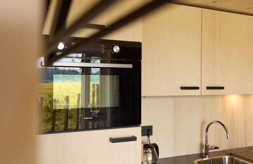 Castricum Apartment | Studio apartment with unobstructed view of meadows and forests near the beach.