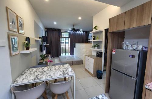 Taman Mount Austin Apartment | Studio with swimming pool access from the patio at Palazio Mount Austin IKEA AEON by GDRAGON HomeStay