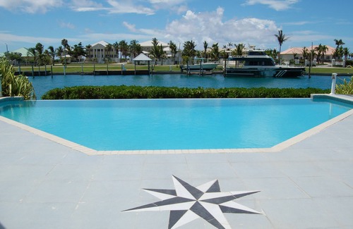 Bahamia West House | Stunning Freeport Grand Bahama Villa on Canal, with Infinity Pool & 40 ft dock