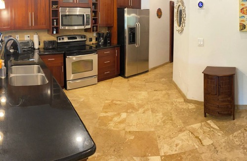 Antoneys Cay Condo | Stunning Infinity Bay. Pool and Ocean View. Mere steps to the beach.