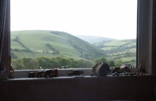 Llanidloes House | Stunning panoramic views & 2 acre woodland with 5 pools, waterfalls & 17 benches