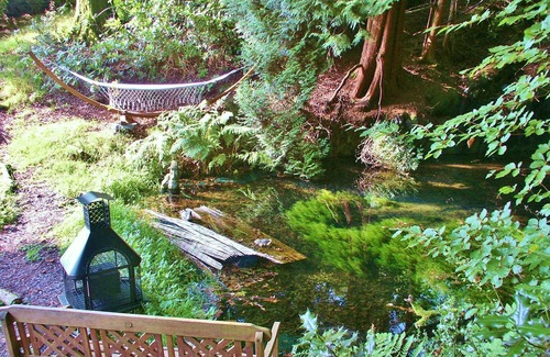 Llanidloes House | Stunning panoramic views & 2 acre woodland with 5 pools, waterfalls & 17 benches
