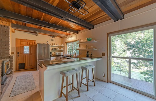 Salyer House | Stunning riverfront gem w/wraparound deck, beach access & game room