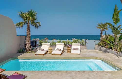 Kalyves Villa | Stunning Seafront Crete Villa | Villa Evander | Private Heated Pool |.