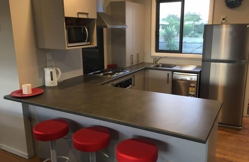 Waitarere Beach House | Stunning, sunny and renovated beach house with 2 spacious decks
