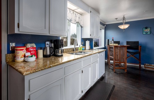 Oak Harbor House | Stunningly Beautiful High Bank Waterfront Property!