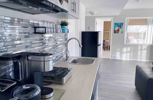 Springbank Hill House | Stunningly Private, Spacious, & Bright Walkout Suite