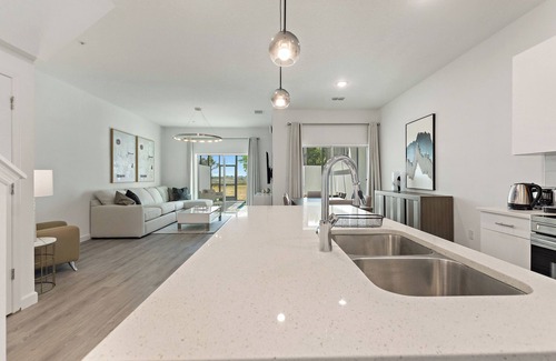 Loughman House | Stylish 3-Story Townhome with Private Hot Tub, Near Disney and Orlando Attractio