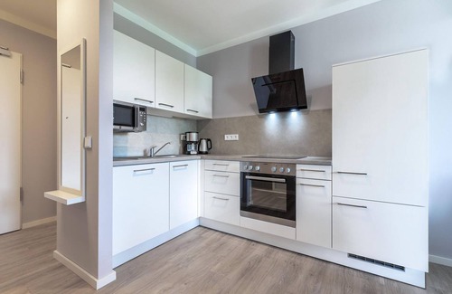 Alt-Travemunde/Ronnau Apartment | Stylish apartment with loggia, right next to the park and only 300 meters to the Baltic Sea -