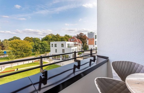 Alt-Travemunde/Ronnau Apartment | Stylish apartment with loggia, right next to the park and only 300 meters to the Baltic Sea -