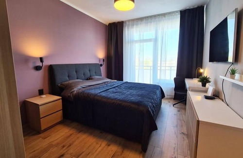 Sarkandaugava Apartment | Stylish apartment with parking & spacious balcony
