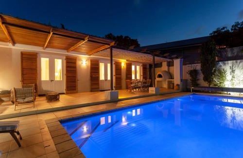 Bishopscourt House | Stylish,comfortable,perfectly located house with heated pool and mountain views.
