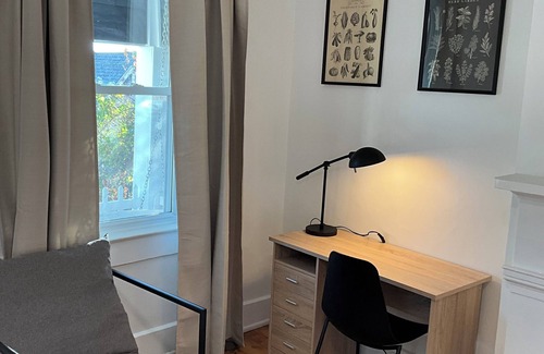 CUF House | Stylish home overlooking the city, walkable to streetcar!