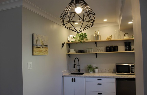 Aurora Apartment | Stylish Main Level Suite with Separate Entrance, Private Patio and 2 Car Parking