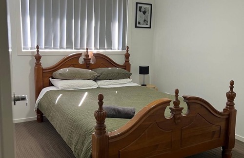 Macquarie Links House | Stylish Retreat in Macquarie Links - Golf, Comfort & Tranquility