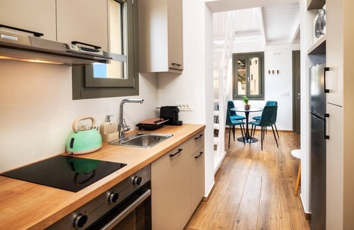 Pyrgos Apartment | Stylish two bedroom apartment with outdoor Hot Tub and private parking