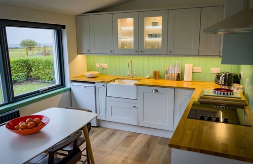 West Laroch Cottage | Stylishly renovated Croft house with uninterrupted views of fields, hills & sea