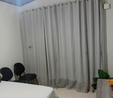 Plano Diretor Sul House | Suíte aconchegante