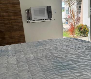 Porto Seguro House | Suíte aconchegante com delicioso café da manhã