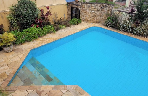 Raul Cury House | Summer in Itanhaém, the largest swimming pool in the region!