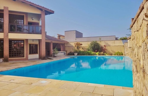 Raul Cury House | Summer in Itanhaém, the largest swimming pool in the region!