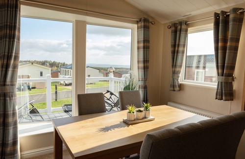 Swarland Cottage | Sun Catcher - a lodge that sleeps 4 guests in 2 bedrooms