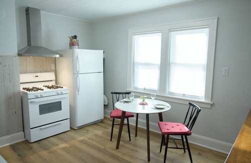 West Allis Apartment | Sunny 1 Bedroom Upper with Personal EV Car Charger
