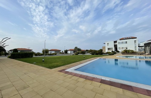 Tatlisu Apartment | Sunny Cypriot Apartment W/Site Pool, Gym and Kids playing area!
