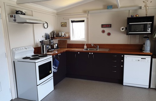 Waitarere Beach House | Sunny, well appointed bach for you to enjoy. Just minutes walk to the beach