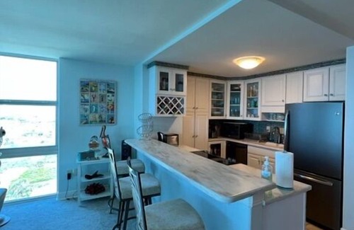 Villa Sabine Condo | Sunset Bay Views! 3BR Condo with Pool, Dock and Beach Access
