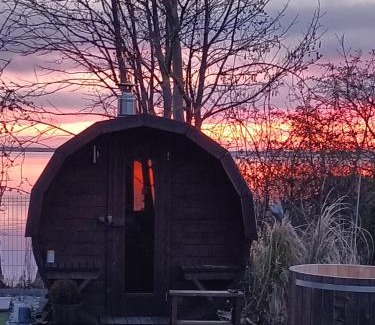 Miedzyzdroje Ski Chalet | sunset cabin on the beach