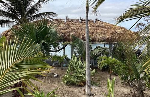 Treasure Cay Condo | Sunset condo with private deck and dock . Steps away from Windward beach.