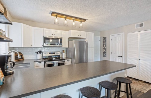 Village of Four Seasons Condo | Sunset Spectacular – Waterfront & Indoor Pool!