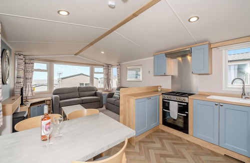 Otterton House | Super 12ft-wide luxurious caravan with one double and two twin.