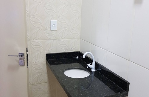 Porto Velho Apartment | Super Comfortable Suite, spacious, well refrigerated, with two beds.